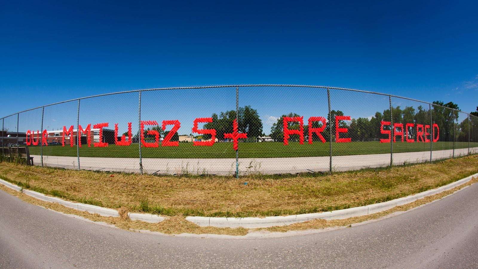 MMIWG2S+ sign on Raleigh Street.